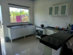 casa axé luz no paraíso